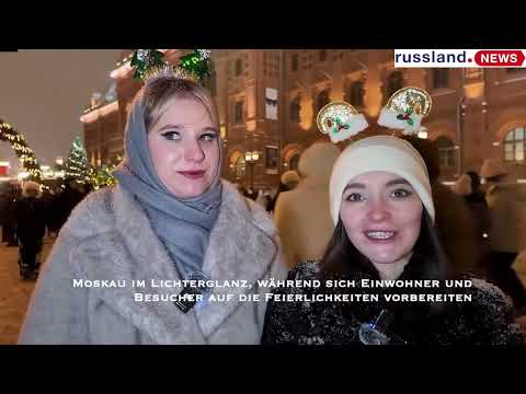 Moskau im Lichterglanz, während sich Einwohner und Besucher auf die Feierlichkeiten vorbereiten Moskau im Lichterglanz, während sich Einwohner und Besucher auf die Feierlichkeiten vorbereiten
