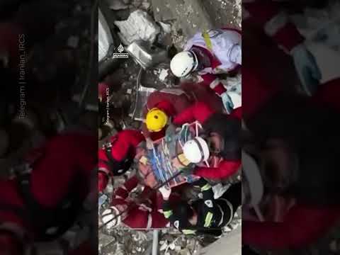 First responders rescue man from Tehran building hit by air strike | AJ #shorts