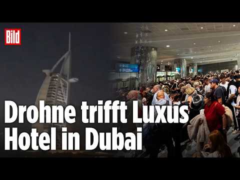 KRIEG IM NAHEN OSTEN: Drohne trifft berühmtes Burj Al Arab Hotel, Chaos am Flughafen Dubai