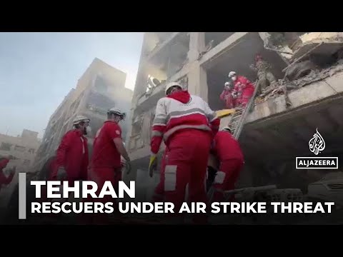 Tehran Red Crescent teams pull survivors from rubble as threat of airstrikes persists