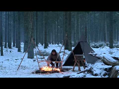 Winter bushcraft trip – canvas hot tent, cooking steak, reindeer skin, homemade axe and knife etc. Winter bushcraft trip – canvas hot tent, cooking steak, reindeer skin, homemade axe and knife etc.