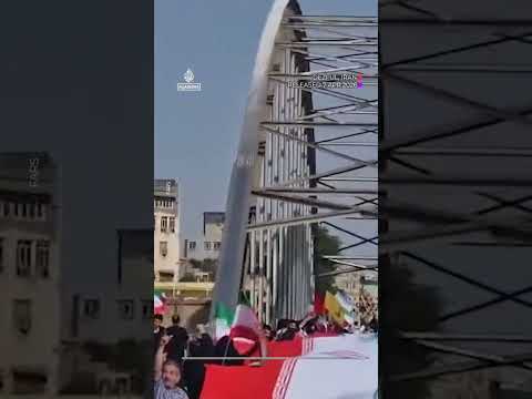 Iranians form human chains across bridges, at power plants | AJ #shorts Iranians form human chains across bridges, at power plants | AJ #shorts