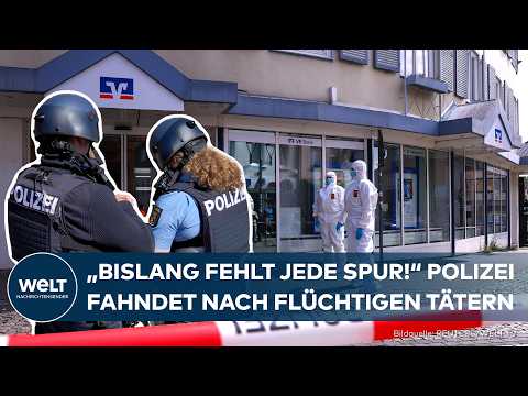 SINZIG BANKÜBERFALL: „Weißer Overall – Imkeranzug“ – Fahndung nach Tätern läuft auf Hochtouren!
